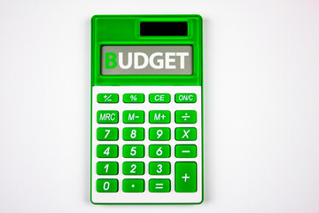 The word BUDGET on a calculator. The concept of calculating the budget, limited financial part, budgeting for the year.