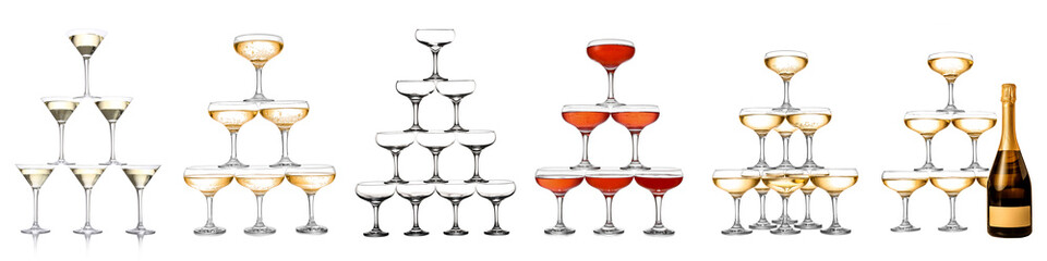 Set of towers made of glasses with champagne on white background