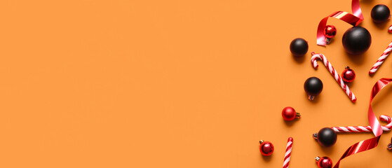 Beautiful Christmas decor on orange background with space for text