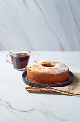 Bundt orange cake with icing sugar