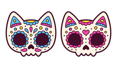 Two Mexican painted cat skulls