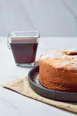 Bundt orange cake with icing sugar