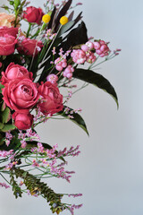 Floral abstract bouquet of peony roses on a light background. Greeting card or wallpaper. Place for text and advertising