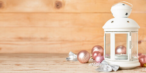 Beautiful Christmas lantern and decor on wooden background with space for text