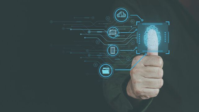 cyber security concept, man's hand scanning finger to go online to access information both accessing the system document storage Banking including online shopping This method is highly secure.