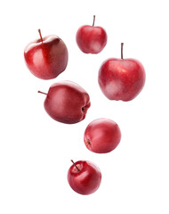 Many flying red apples isolated on white
