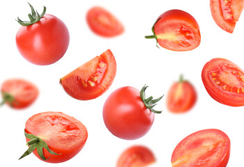 Fresh flying tomatoes isolated on white