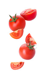 Fresh flying tomatoes isolated on white