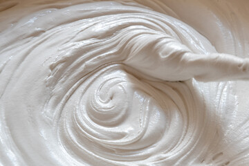 Stirring the building mix. Putty for walls. Beautiful slow motion, the texture of the putty is...