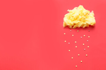 Composition with cotton candy cloud and stars on red background