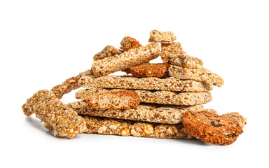Heap of crushed sesame kozinaki on white background