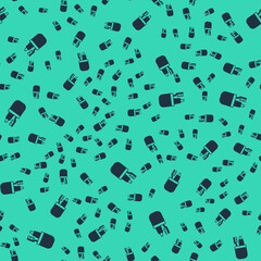 Black Toothbrush and tube of toothpaste icon isolated seamless pattern on green background. Disposable bathroom supplies. Vector