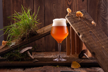 A glass of beer on a wooden table. Oktoberfest concept