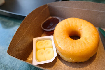 Doughnut serve with butter and jam for relax or coffee break time