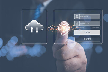 Businessman scanning thumb for login systems security of the database. Using the thumb to scan for digital processing biometric identification to access security system.
