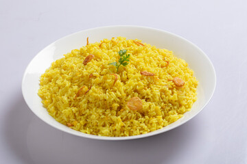 Bengali dish khichdi or khichuri made from a combination of lentils and rice along with Indian spices. in a mud bowl isolated on white background Bengali dish khichdi or khichuri.