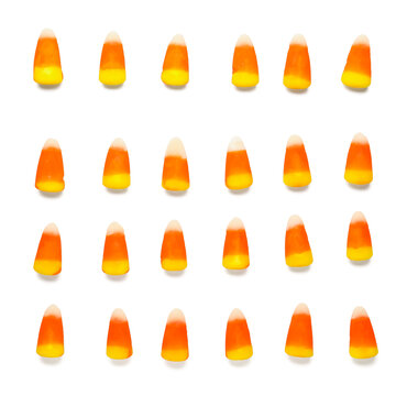 Halloween candy corns on white background