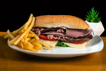 roast beef sub  with tomato lettuce and cheese