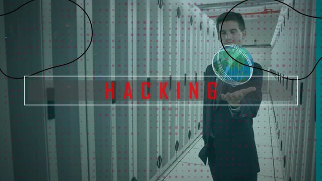 Animation of hacking text banner over caucasian businessman holding invincible object in server room