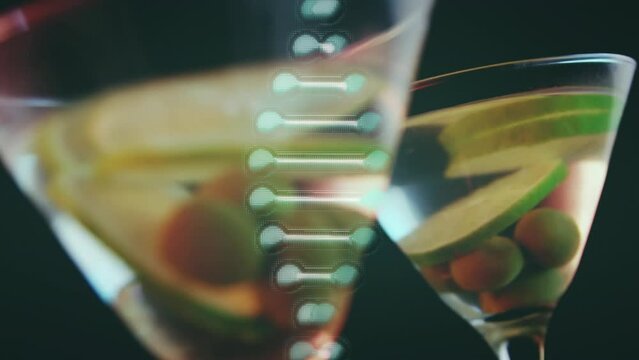 Animation of dna strand over drinks with olives and lime on black background