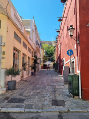 View of colorful houses at the narrow streets of the Greece.