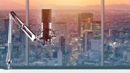 Business radio. Microphone for recording business podcasts. Studio table microphone and skyscrapers. Blurred downtown. Studio radio station photograph of city on wall. Recording microphone