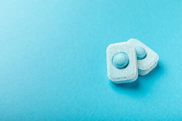 Water softener tablets on a blue background
.FLAT LAY. Place for text.Space for copy.Top view....