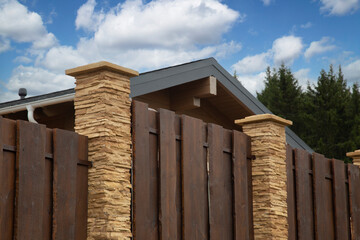 Modern fence around the house.Design and architecture of a modern house.