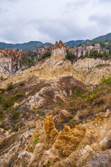 Los Estoraques Unique Natural Area, national park in the Cordillera Oriental of Colombia, Norte de Santander Department. Large brownstone pedestals and columns formed by erosion. Travel destination