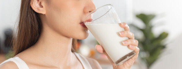 Close up of Woman drinking milk