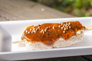 赤そばの入ったそばがき棒