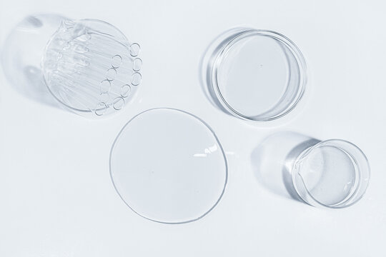 Petri dish, gel, flask, crystallization bowl. Test tubes, Laboratory. View from above. Medicine, gel texture, white, pipette, samples, research. Material collection. Glass baguette.