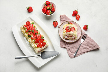 Composition with delicious strawberry roll cake and ripe berries on light background
