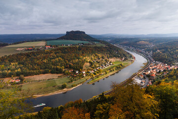 Fototapeta na wymiar View of a village in the countryside in autumn near Saxon Switzerland Mountains. Valley of river Elbe. Dresden. Germany. 