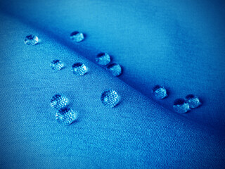 Technological blue waterproof and breathable fabric with drops
