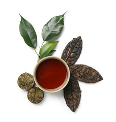 Dry pressed puer tea with cup and leaves on white background