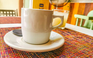 Cup of americano black coffee in restaurant Mexico.