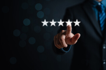 Customer businessman touching glowing illustration five stars rating service on virtual screen for satisfaction evaluation survey and review.