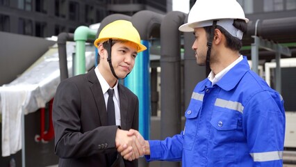 Businessman and construction engineer having a discussion.