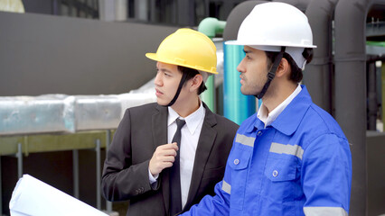 Businessman and construction engineer having a discussion.