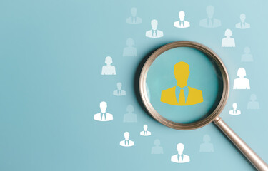 HRM or Human Resource Management, Magnifier glass focus to manager icon which is among staff icons for human development recruitment leadership and customer target group concept. - obrazy, fototapety, plakaty
