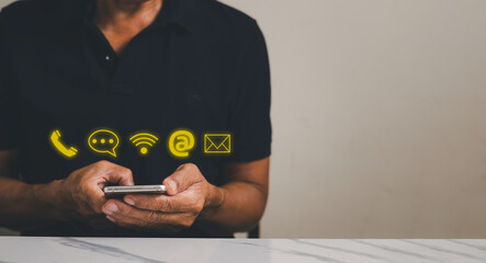 Businessman using smartphone with email, phone, address, chat message icon. Customer Support...