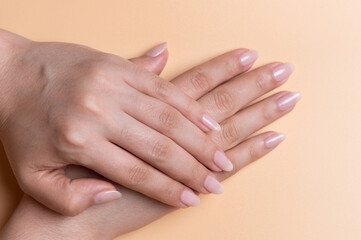 Woman hands on top of each other