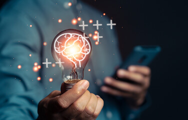 Businessman holding lightbulb for presenting new ideas Great inspiration and innovation new beginning. creative smart thinking ideas and innovation.