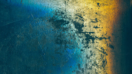 Grunge texture. Weathered wall. Aged concrete structure. Blue yellow black color stains dust scratches noise on dark abstract illustration background.