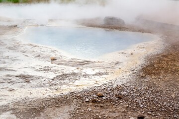 Hot pools of water with steam in Iceland