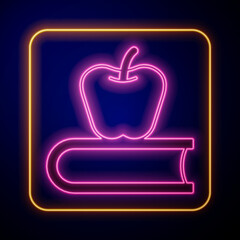 Glowing neon Book with apple icon isolated on black background. Vector