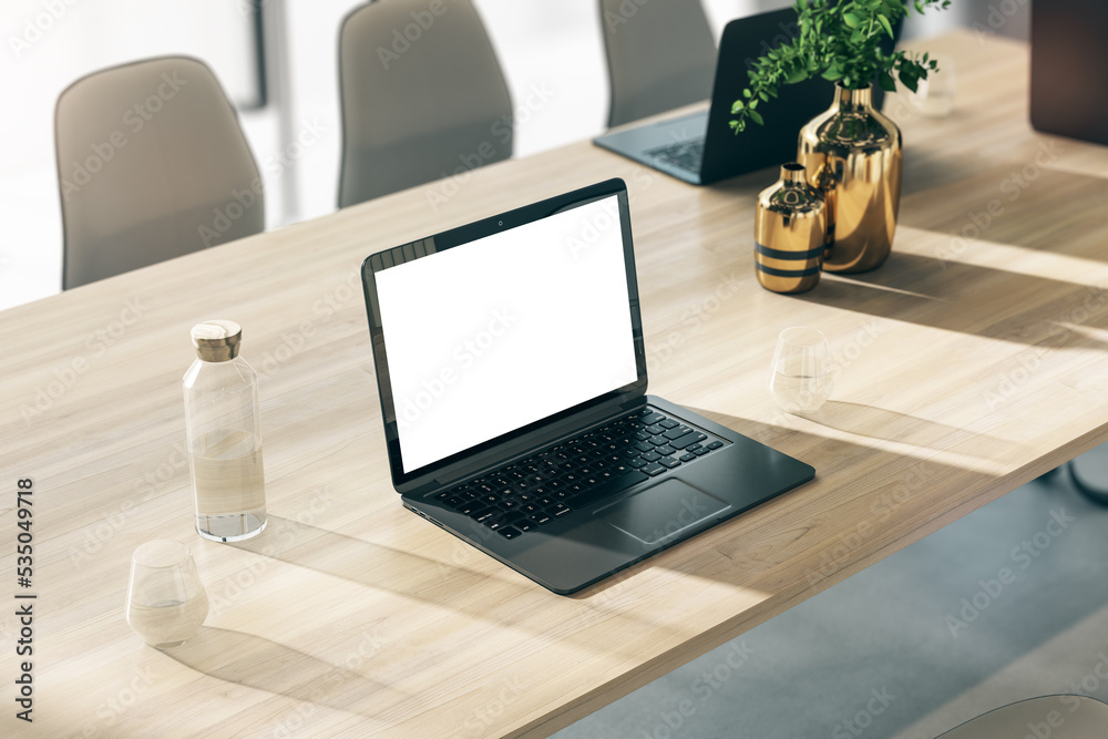 Poster perspective view on modern black laptop with blank white screen with space for your logo or text on 