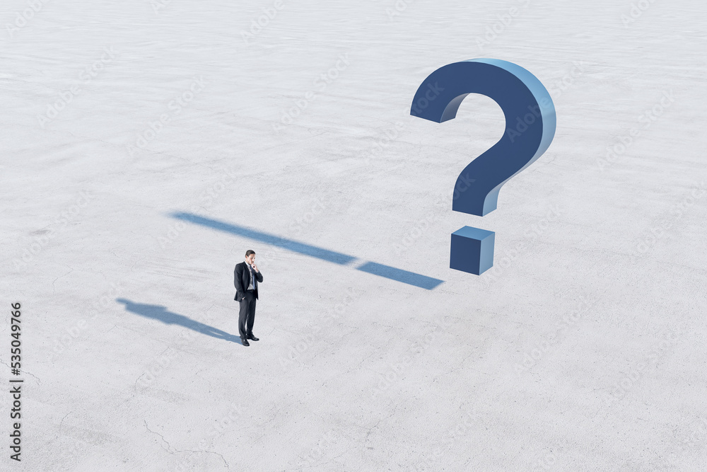 Poster answer concept with confused man in black suit and blue question mark on concrete surface