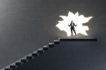 Inspiration, right decision and motivation concept with happy and satisfied woman on the top of stairway on big hole in dark wall background
